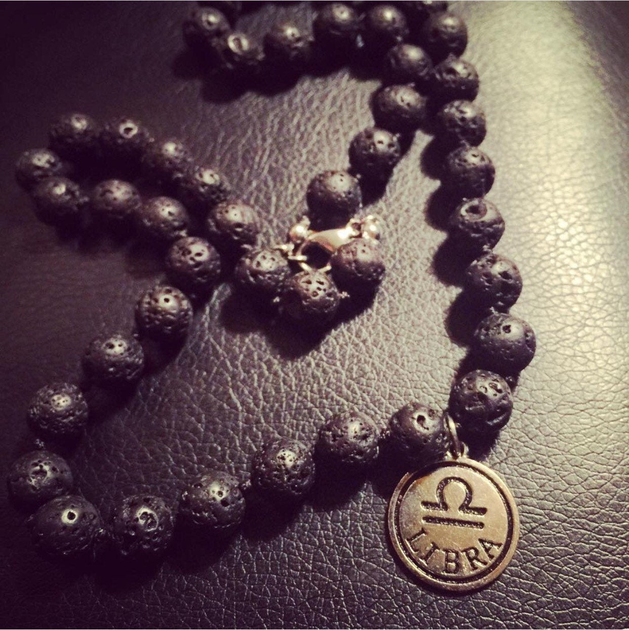 Black lava rock zodiac necklace